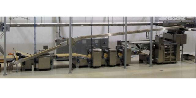 Baker Perkins forming line: (from right to left) laminator, 3 gauge roll units, relaxation conveyor, rotary cutter, scrap lift and return conveyors 
