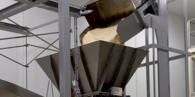 Lift and tilt units to feed the sheeter hopper from a dough tub