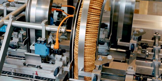 Biscuit feed chutes on a Baker Perkins high speed sandwiching machine